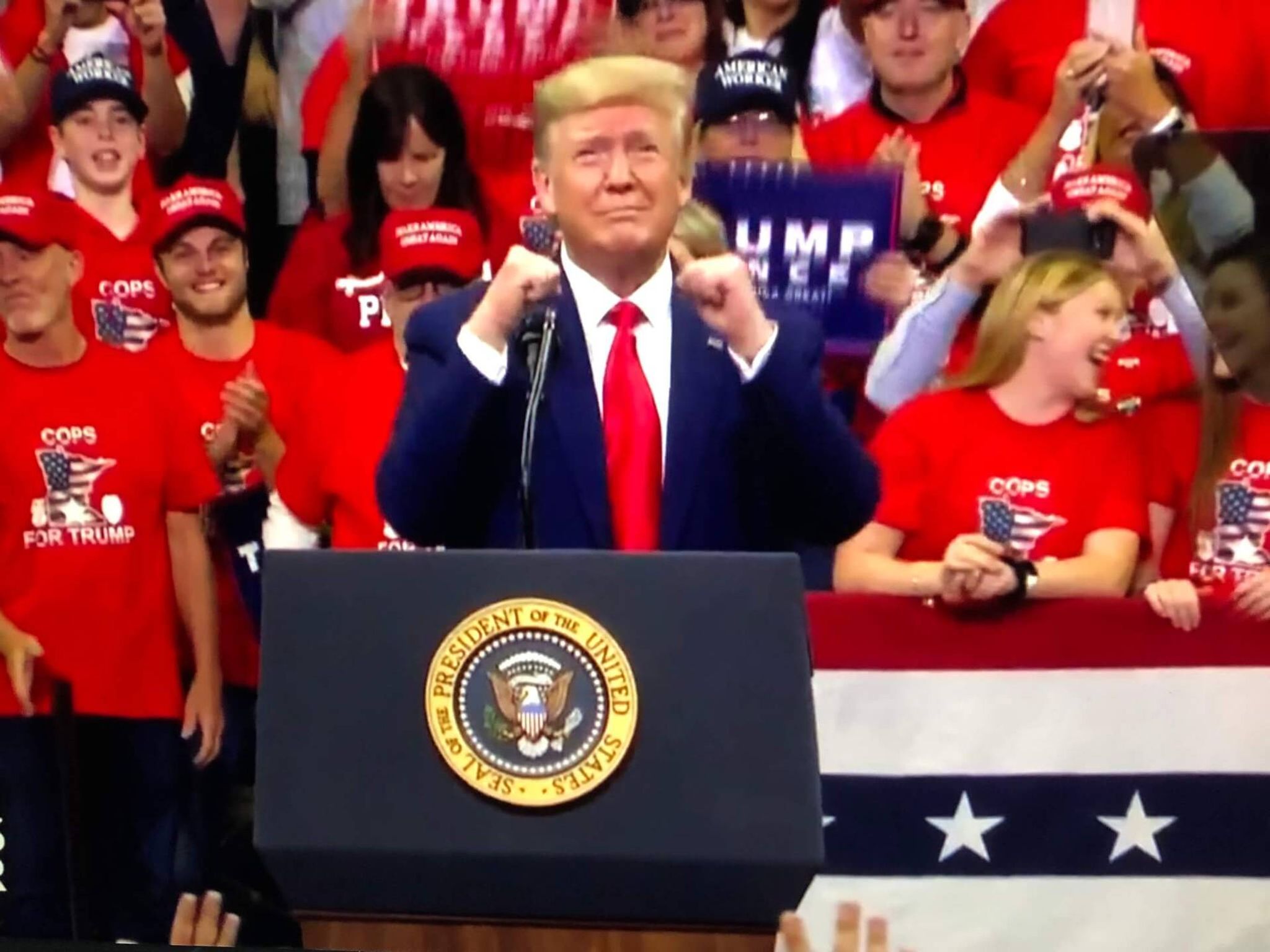 President Donald Trump addresses a rally in Minneapolis.