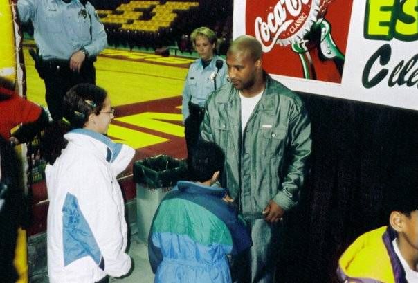 The author and her brother, Michael, meet former Vikings quarterback Daunte Culpepper at Williams Arena in 2000.