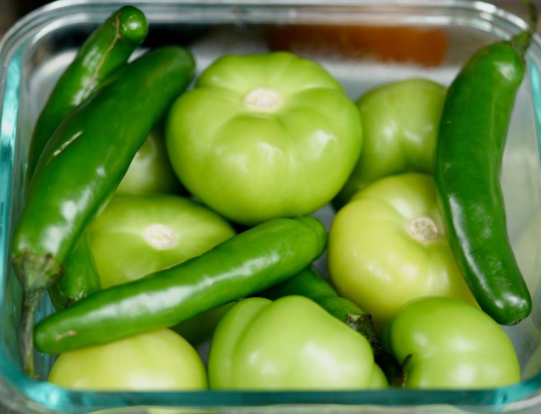 Tomatillos and serrano peppers are key ingredients in Alarcon's mole verde
