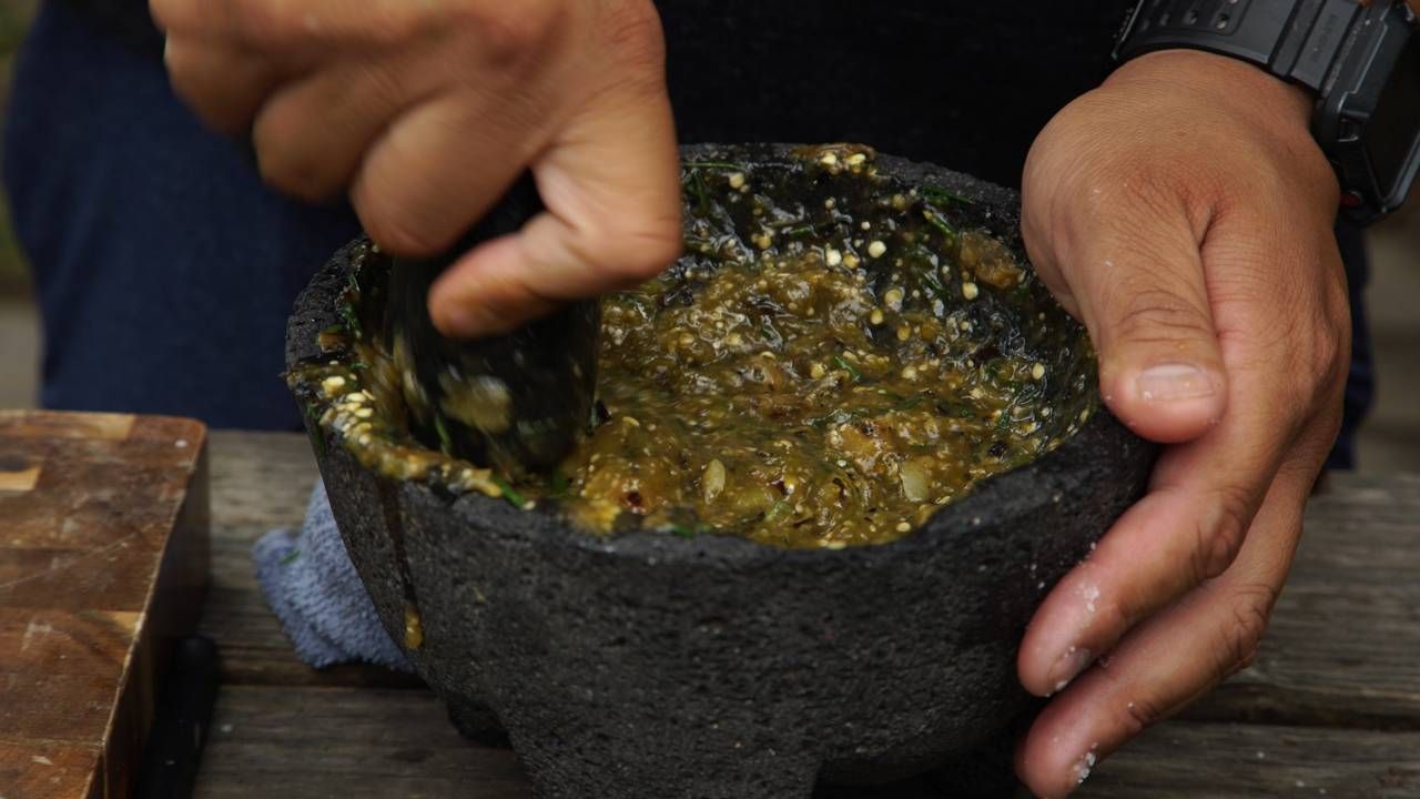 Roasted salsa verde made with a mortar and pestle