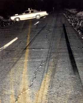 A photo of where Johnson's vehicle skidded, courtesy of Marshall County Historical Society.