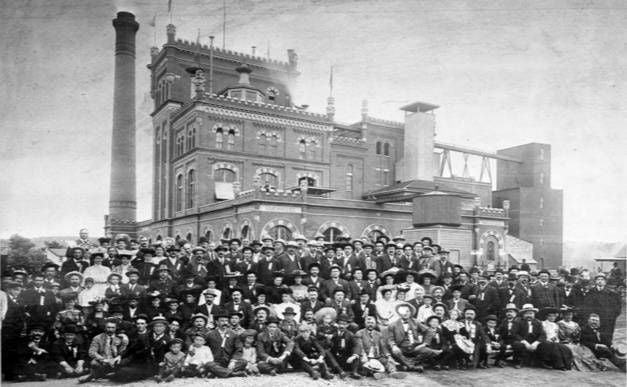 a large group of people in front of a building