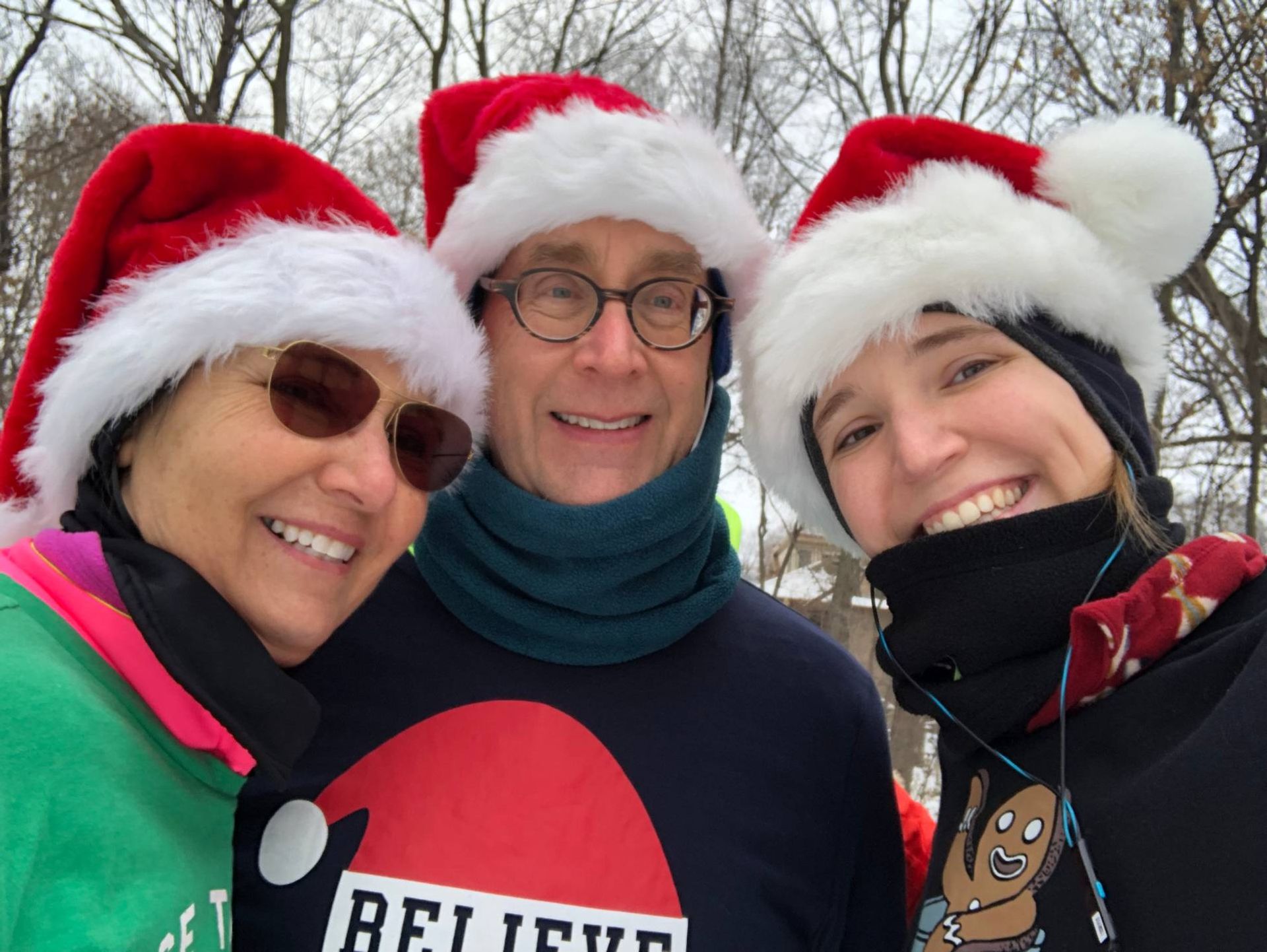 The author with her parents during a holiday-themed Reindeer Run. The weather outside may be frightful at times, but running can make it vaguely delightful - at least post-run.