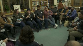 a group of people sitting in a room