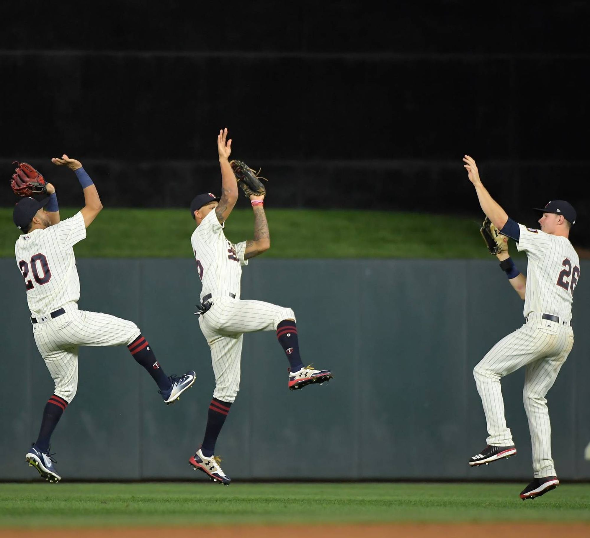 Twins outfielders celebrating a win. Photo courtesy of the Star Tribune.
