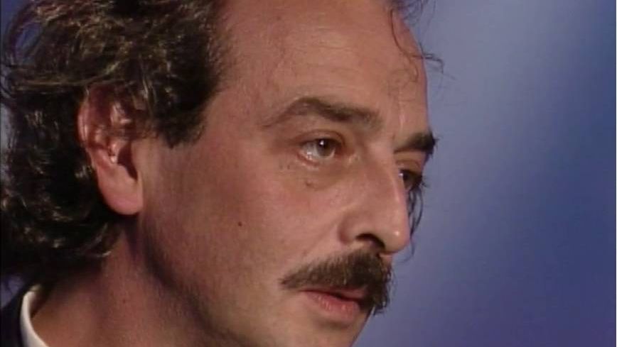 dominique serrand with a mustache