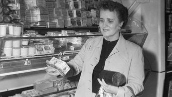 Rep. Coya Knutson (D-Minn.), is shown shopping in a supermarket in 1955 following her demand to know why her fellow housewives remain saddled with high grocery bills while farm income continues to drop. Photo courtesy of NPR.