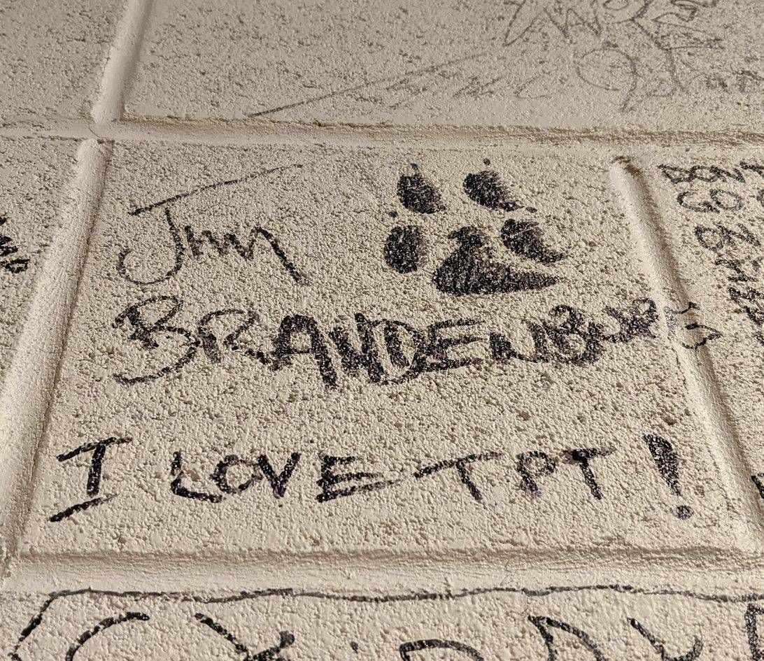 The wall in the hallway leading to the TV studio is adorned with thousands of signatures. It's Minnesota's unofficial Wall of Fame.