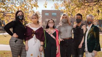 a group of people wearing masks