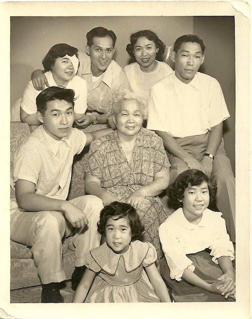 Tsui Sugimura (center), her children and two grandchildren, post-WWII