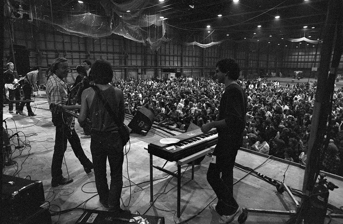Wide view of the U of M field house, with The Minneapolis Rockestra performing at M-80. Photo by Mike Barich.