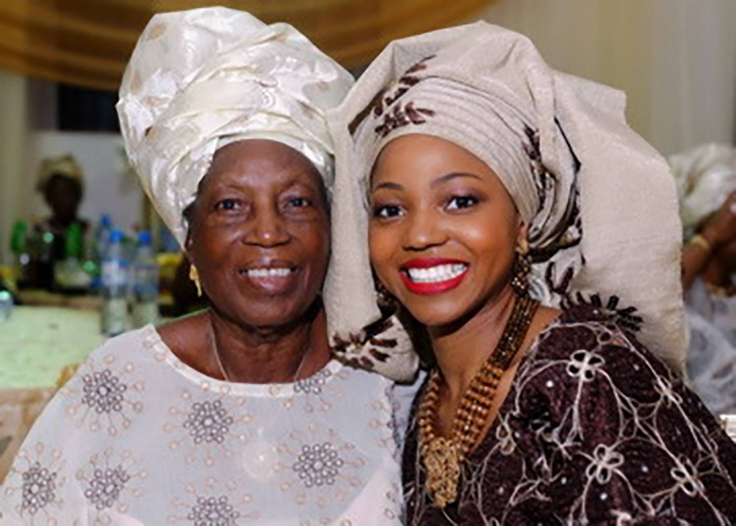 Gladys and her grandma wearing one of their traditional fabrics - aso oke - during Glady's wedding. Traditionally, the wedding party and family members will wear aso oke while guests wear Ankara prints. Note: The type of traditional fabric worn is also often based on preference.
