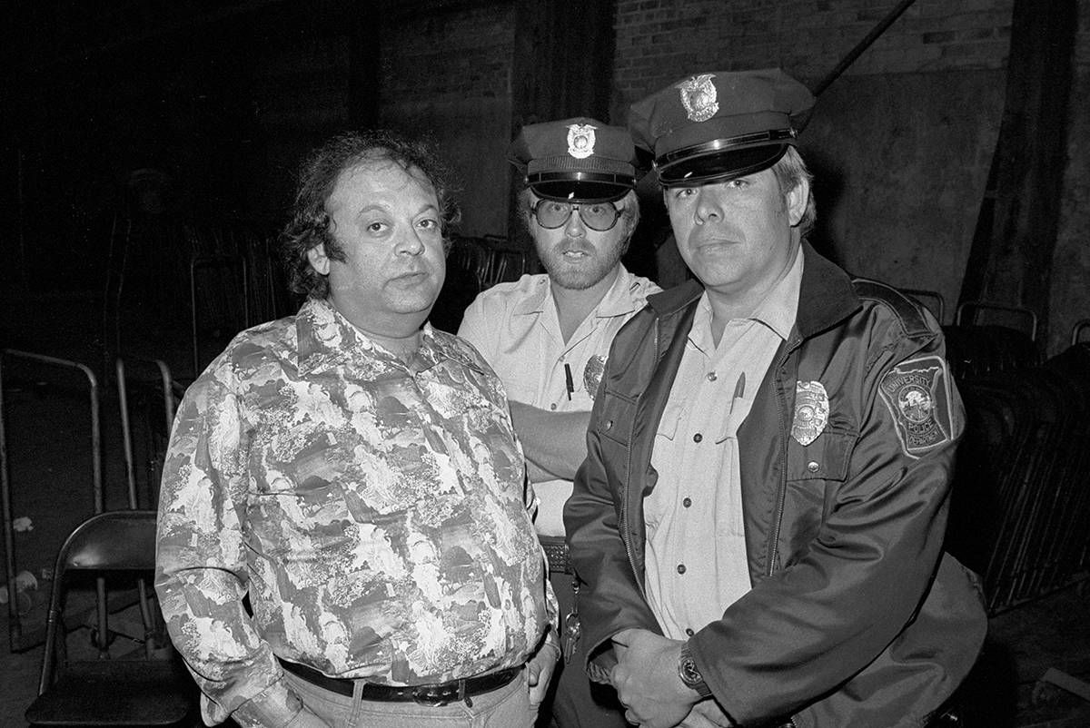 Hartley Frank, who ran the Longhorn, backstage at M-80. He must have changed out of his bathrobe. Photo by Mike Barich.