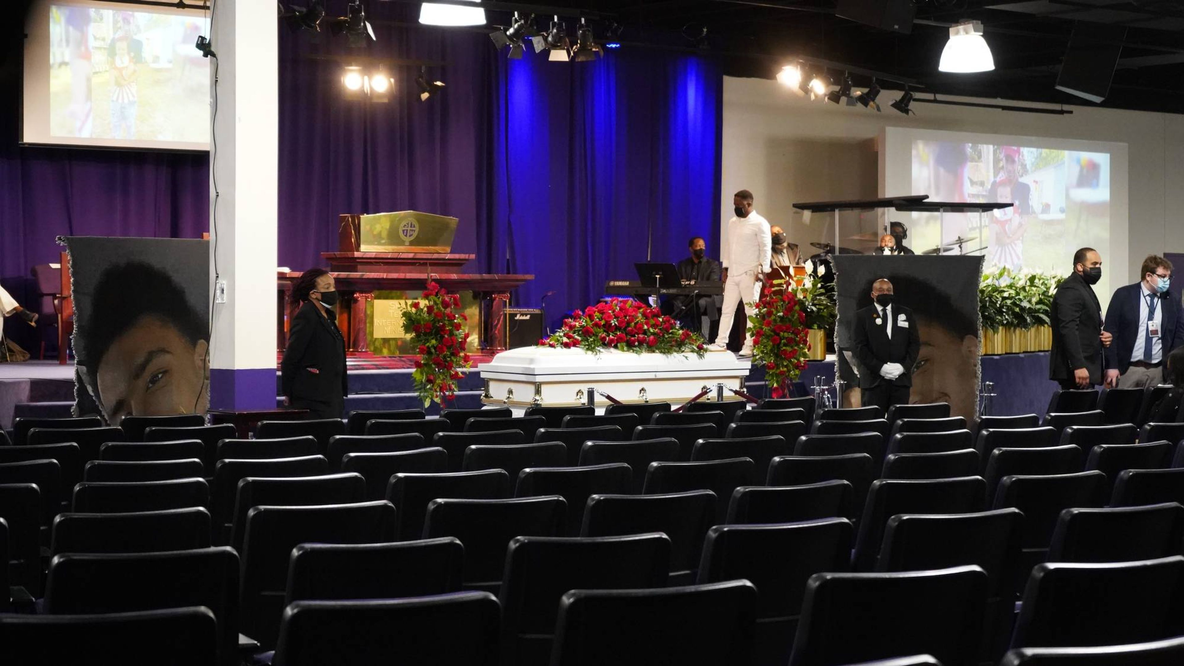 Duante Wright's casket sat in the Shiloh Temple International Ministries in Minneapolis. As mourners entered, a media player shuffled pictures and videos of Wright playing with his family and friends.