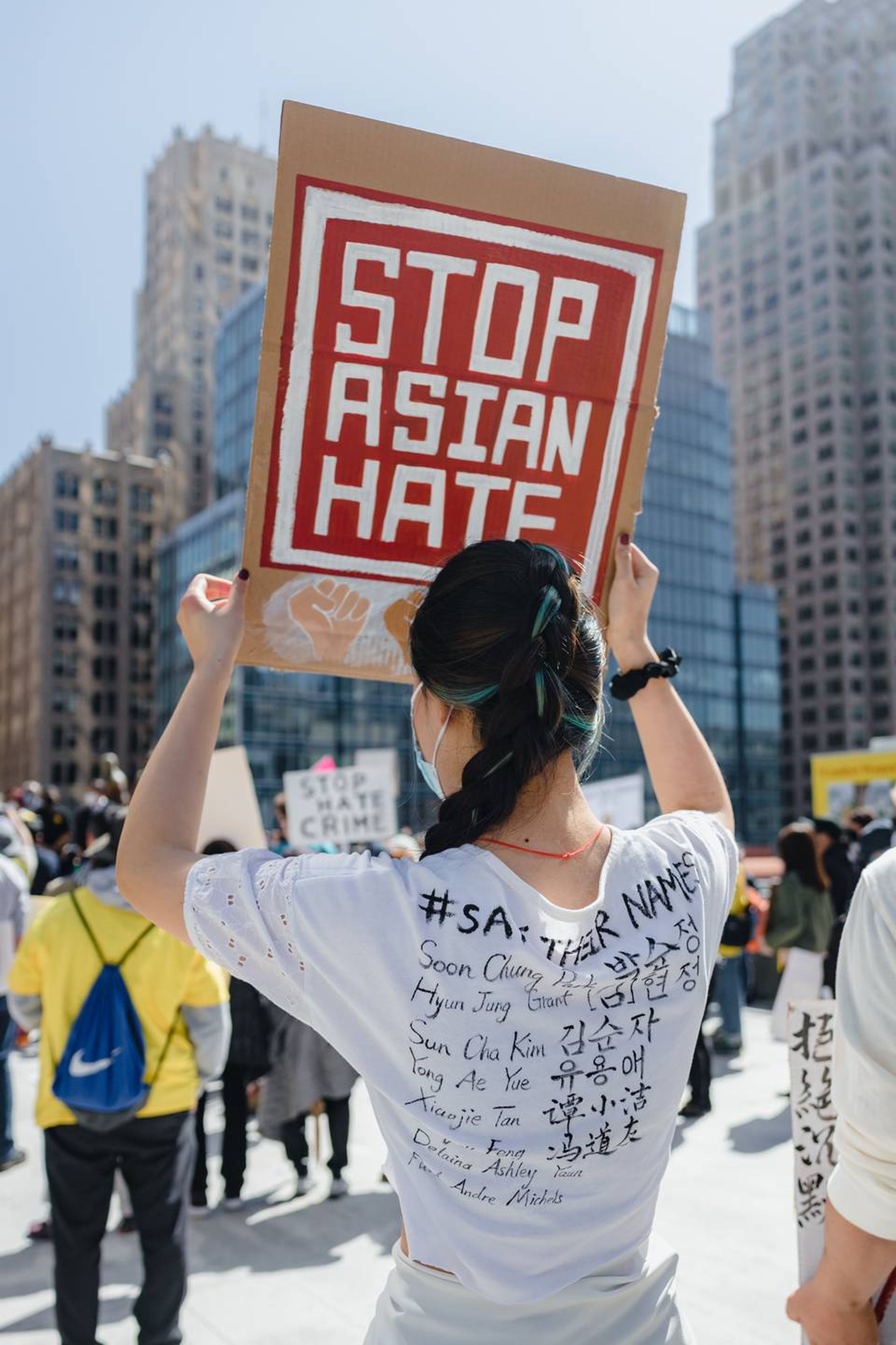 People gather to protest Asian hate. Photo by Jason Leung | Unsplash.