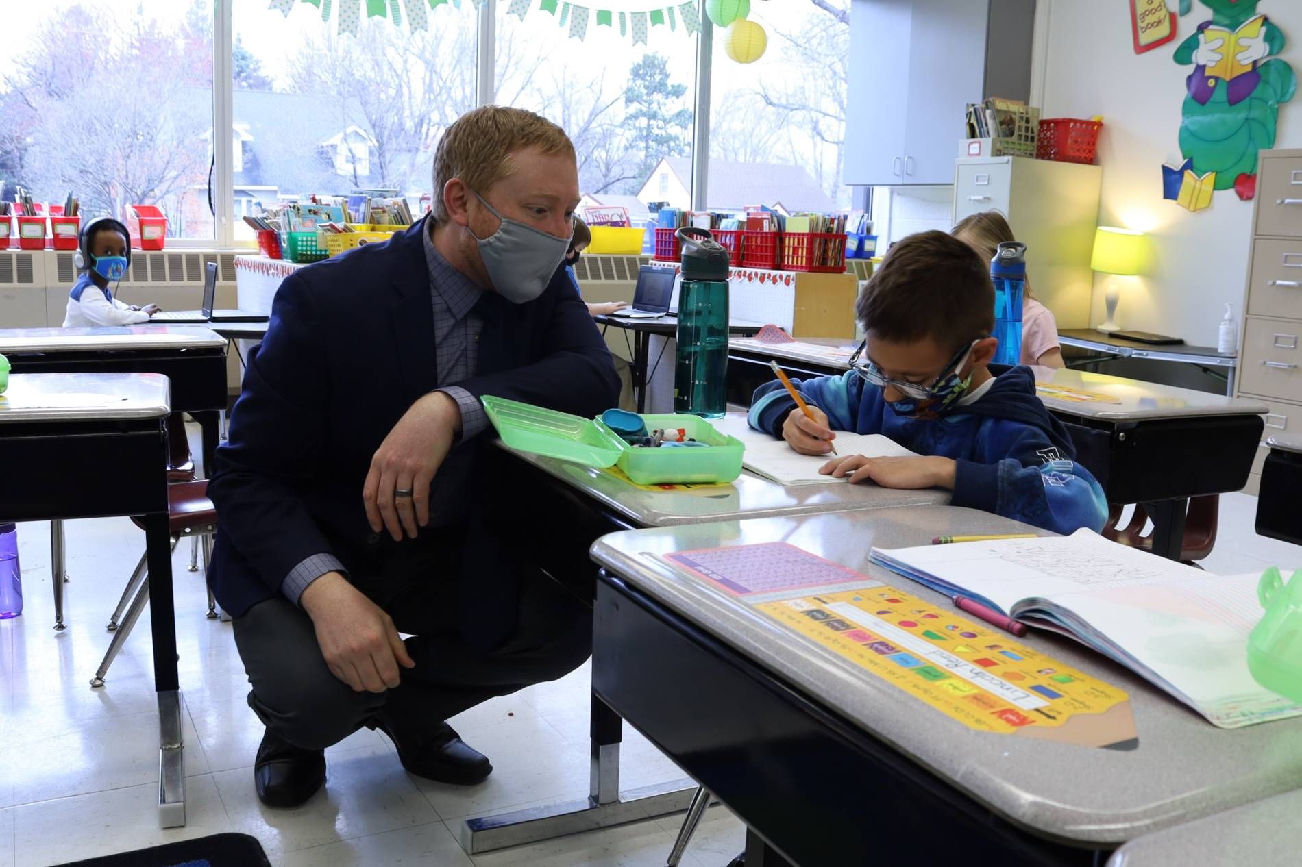 Principal Skinner visits a Pinewood Elementary School student.