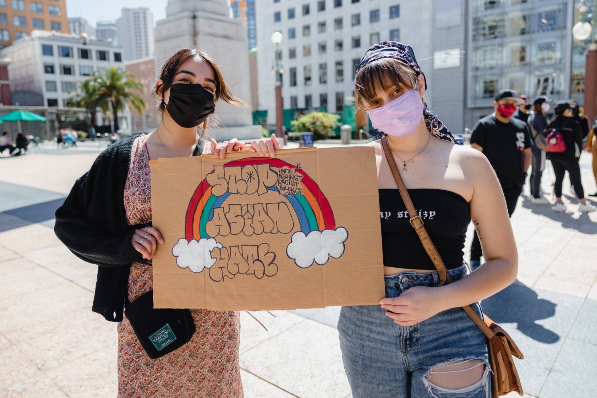 Stop Asian Hate sign at a demonstration. Photo by Jason Leung | Unsplash.