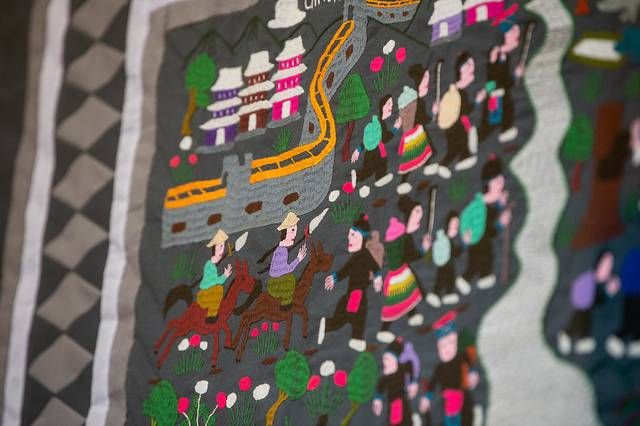 This story cloth depicts the Hmong fleeing from Imperial China.