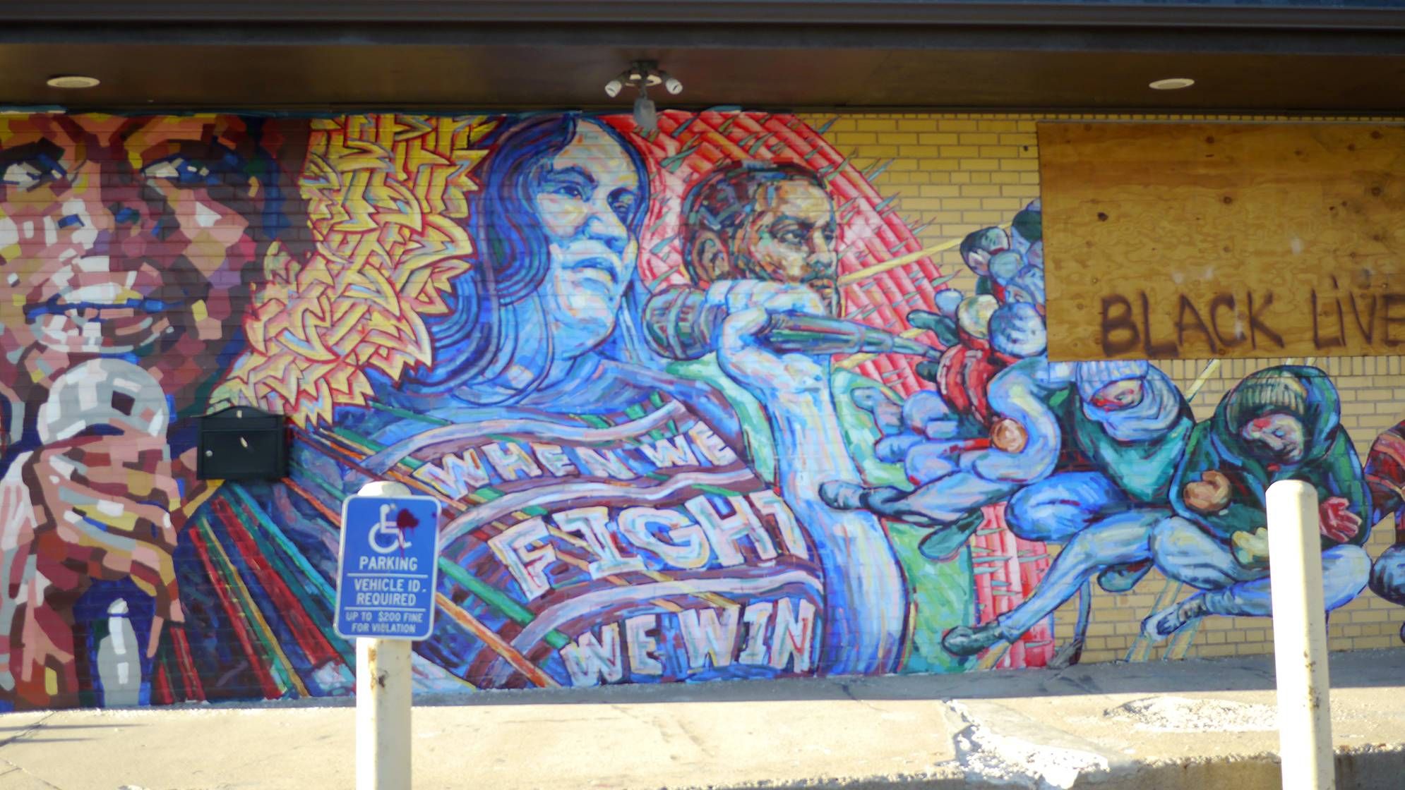 Photo of a mural featuring a woman with a microphone