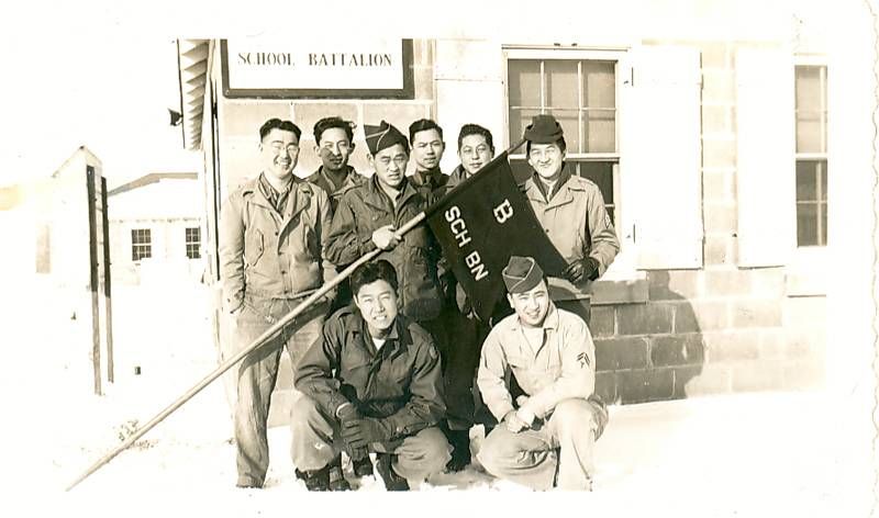 a group of people posing for a photo