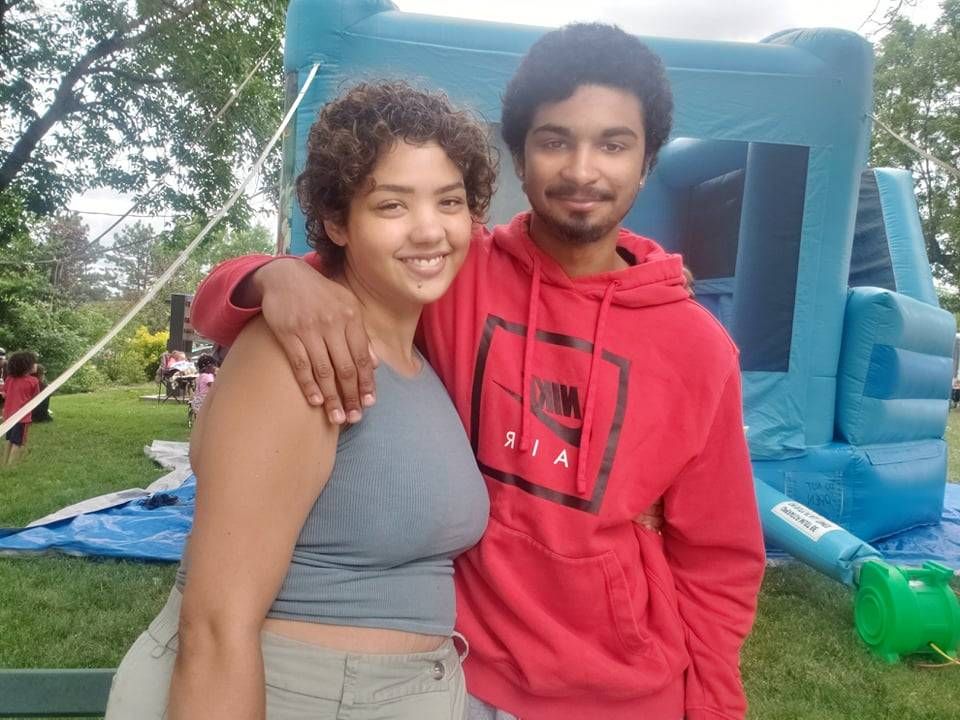 Megan Philiips (left) and her brother outside Chisholm's Juneteenth celebration