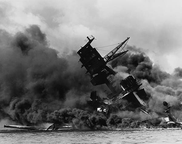 USS Arizona burning in Pearl Harbor