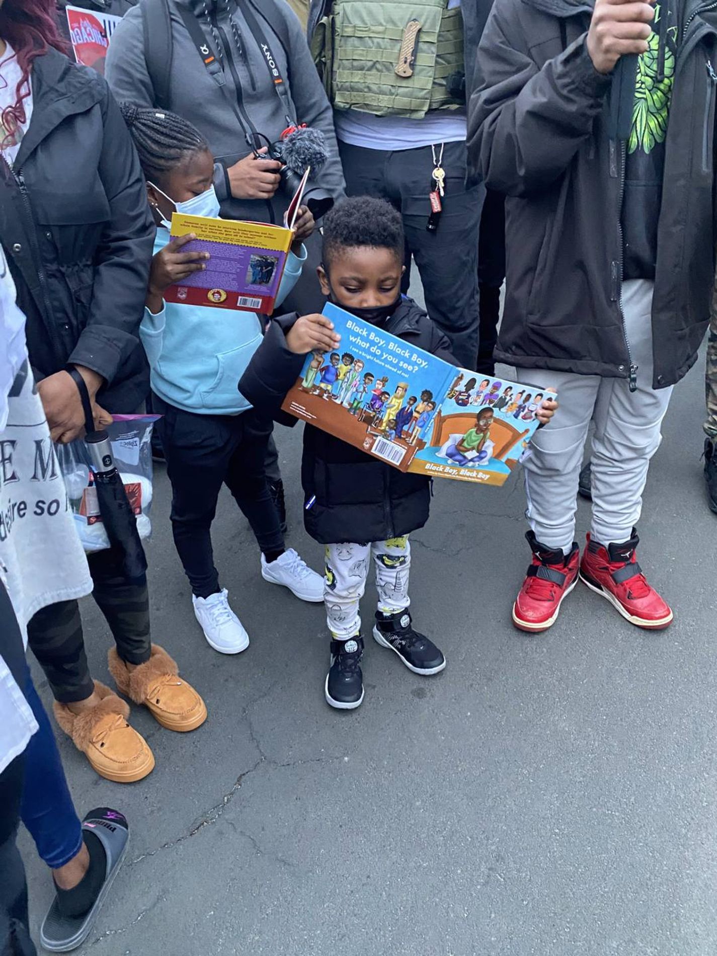 A young fan of Black Boy, Black Boy dives into the book. | Photo courtesy of Crown Shepherd.