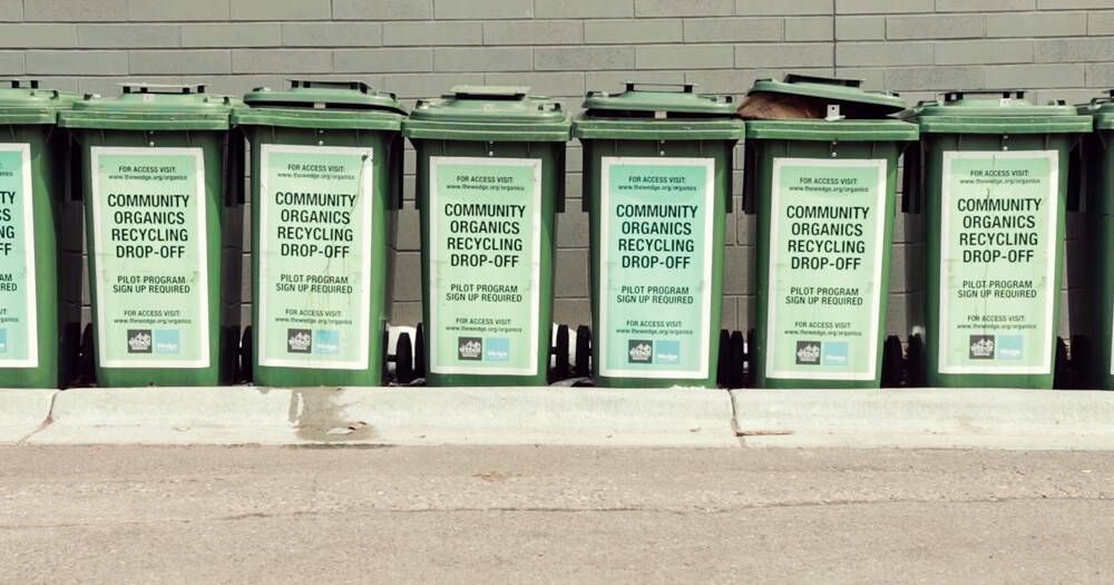A line of community organics recycling cans. Rewire PBS Our Future Composting