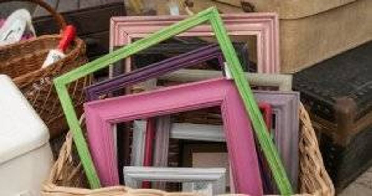 Differed colored painted wood frames in a basket for sale. Decorate Sustainably pbs rewire