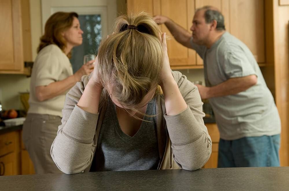 Young Woman agonizes while parents fight. Rewire PBS Love Parents' Divorce
