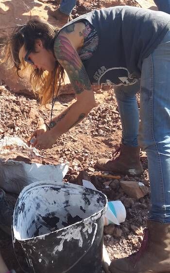 Photo of Jingmai O'Connor working on a paleontology dig. pbs rewire