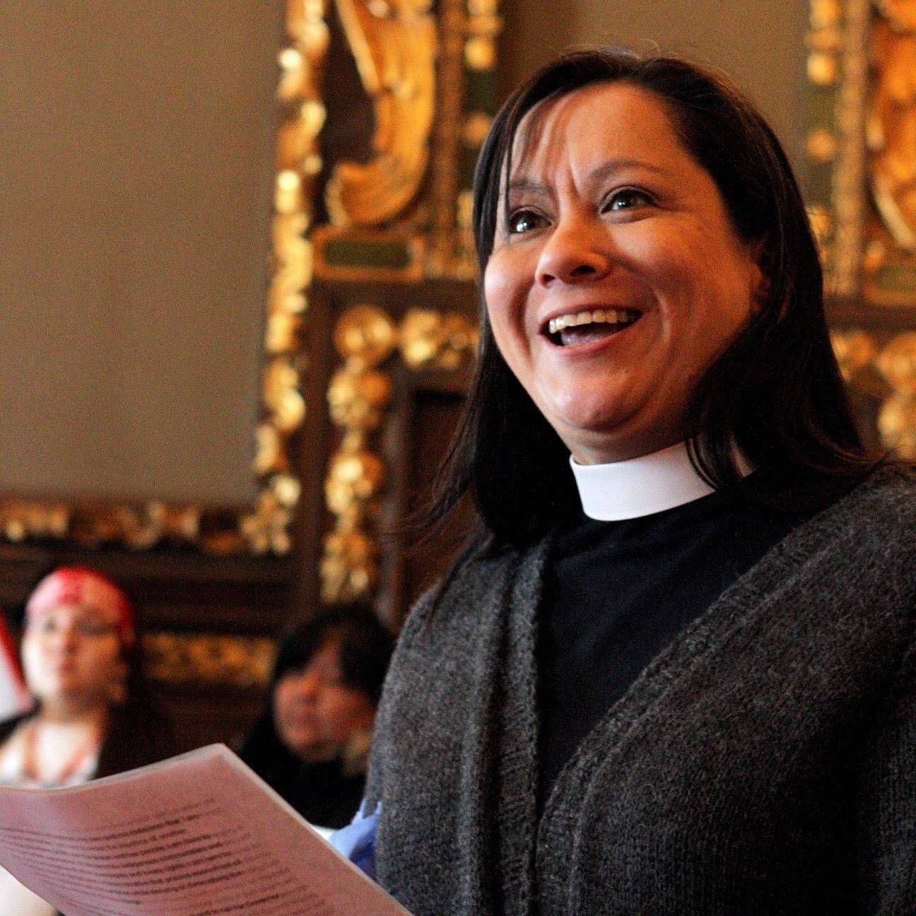 Dana Neuhauser, Minister of Public Witness at New City Church. REWIRE PBS Our Future protest