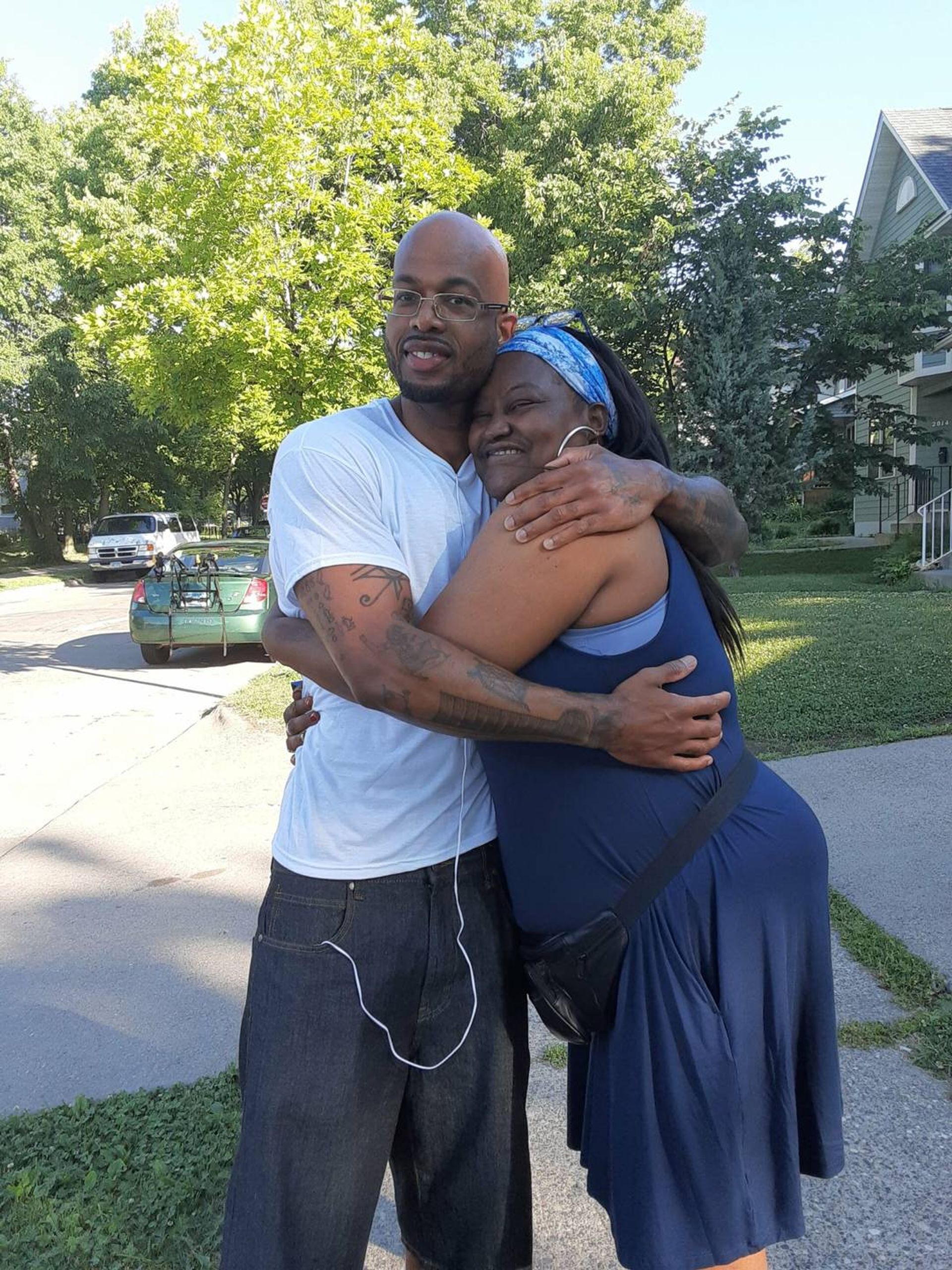 A photo of Antonio Williams hugging his mother. Rewire PBS Our Future Can't Vote