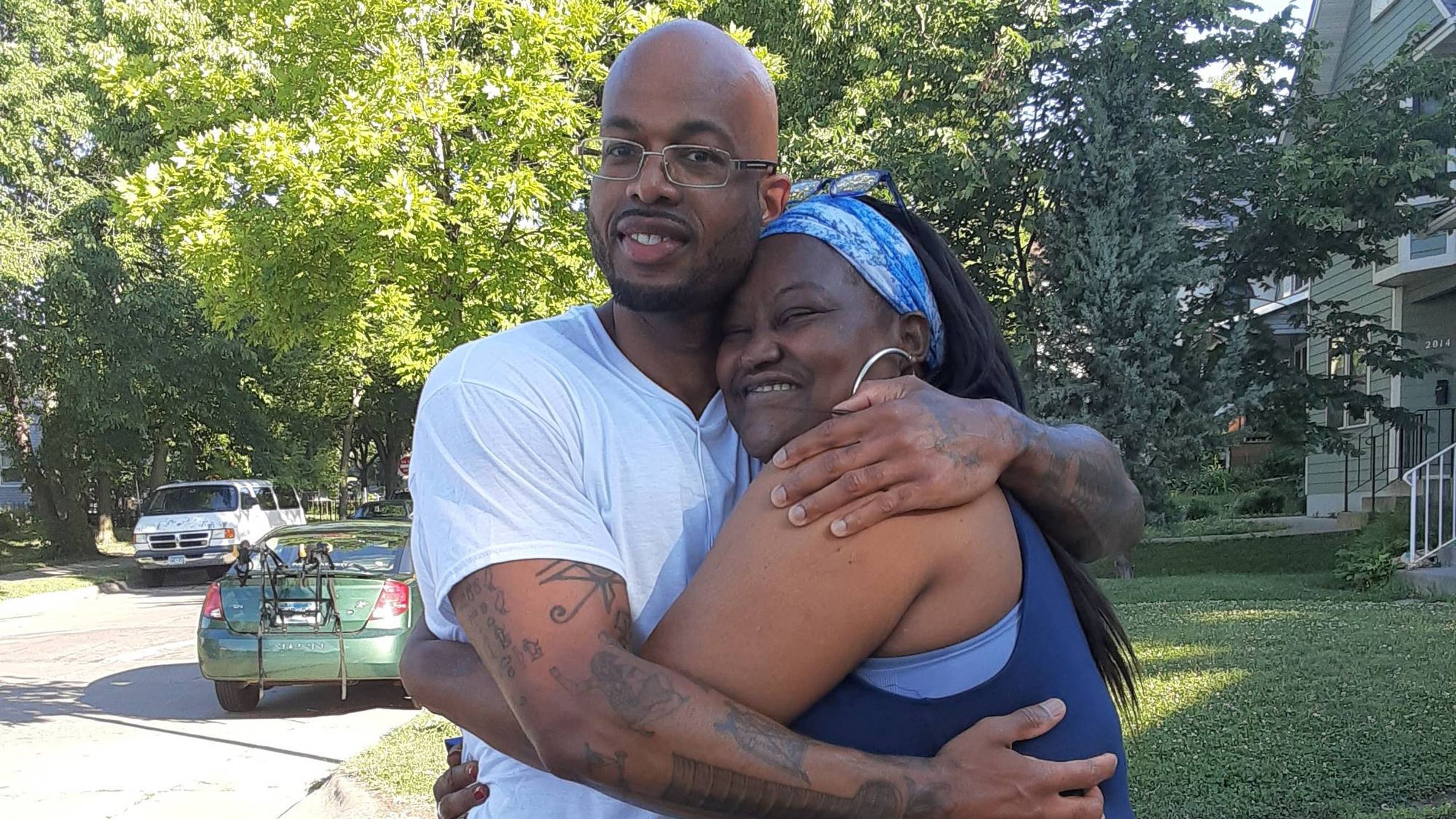 Photo of a Black man, Antonio Williams, hugging his mother. Rewire PBS Our Future Can't Vote